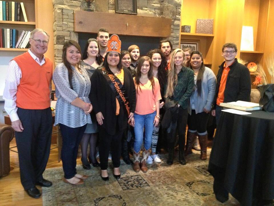 Miss American Indian OSU pictured standing with NASA executive members and OSU President Burns Hargis.
