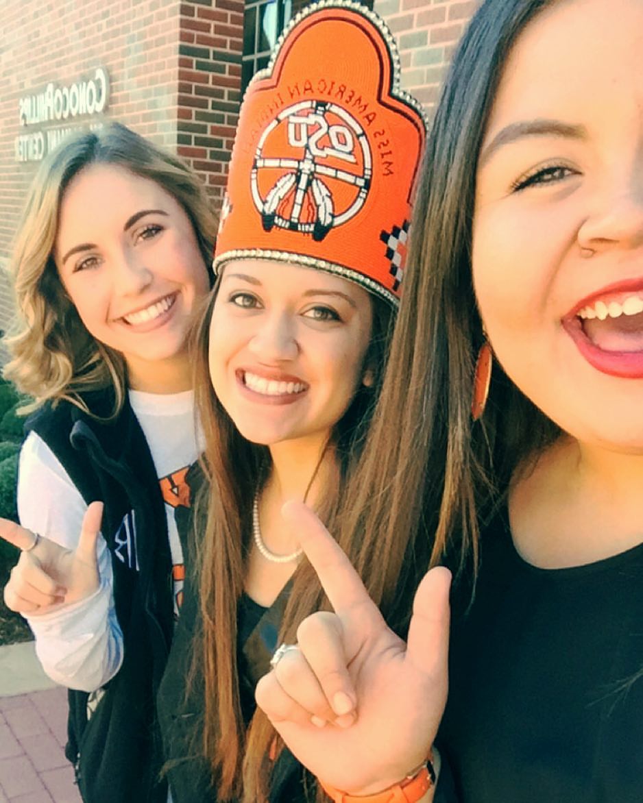 Miss American Indian OSU Pictured smiling with friends for a selfie