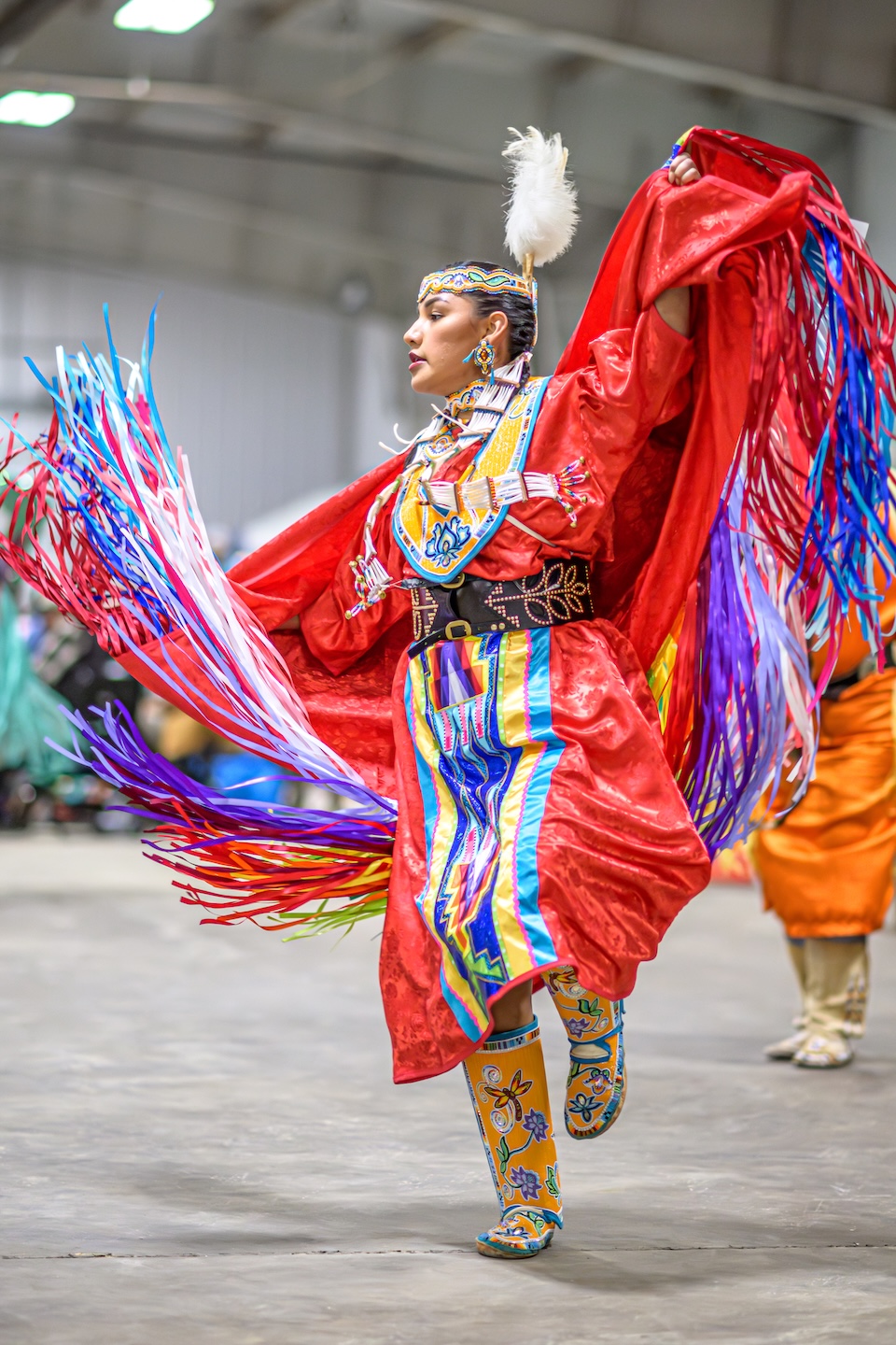 Women's fancy dancer dancing